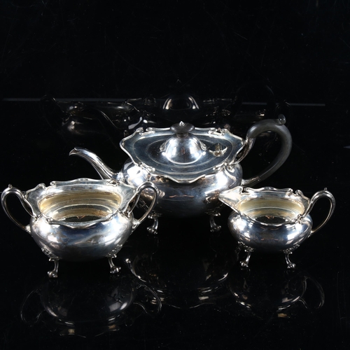 477 - An Edwardian Scottish silver 3-piece tea set, comprising teapot, 2-handled sugar bowl and cream jug,... 