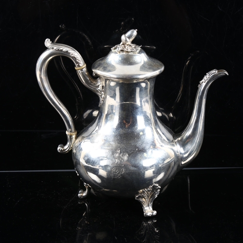 486 - A Victorian silver coffee pot, baluster form with cast acorn finial, scrolled acanthus leaf handle a... 