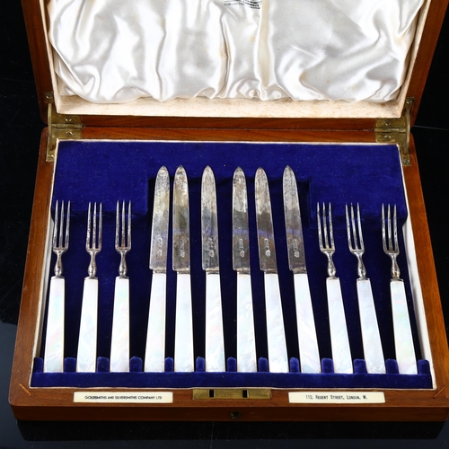 493 - A cased set of Edward VIII silver-bladed mother-of-pearl handled dessert cutlery for 6 people, by Go... 