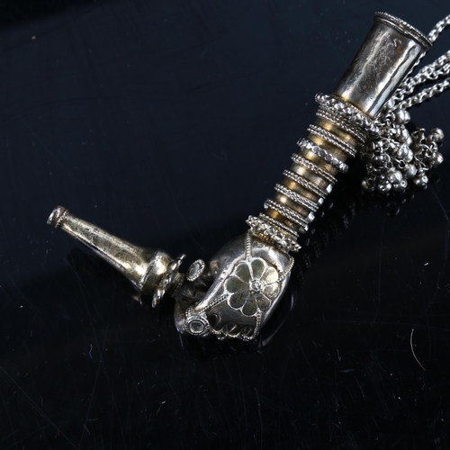 496 - An unusual Eastern unmarked silver figural hand opium pipe, with stopper, length 9.5cm, 1.9oz