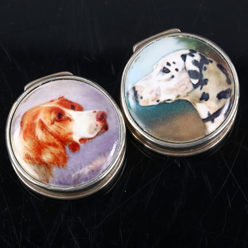 426 - A pair of silver printed porcelain dog pillboxes, diameter 3cm (2)