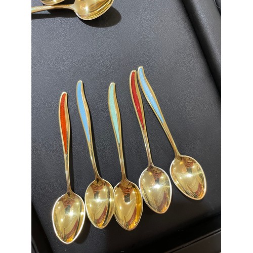 458 - A set of 12 Danish vermeil sterling silver and harlequin enamel coffee spoons, various makers, lengt... 