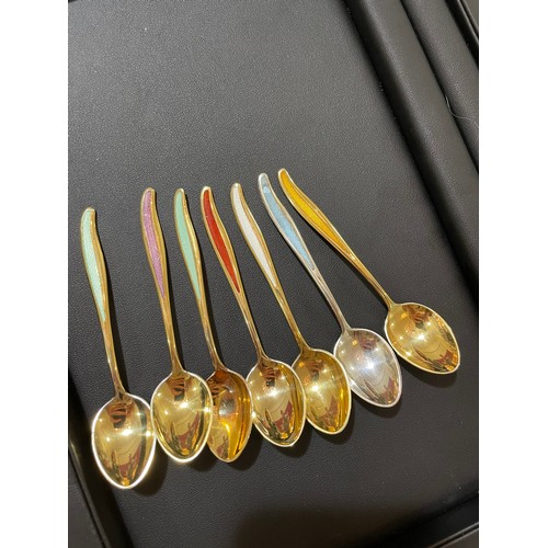 458 - A set of 12 Danish vermeil sterling silver and harlequin enamel coffee spoons, various makers, lengt... 