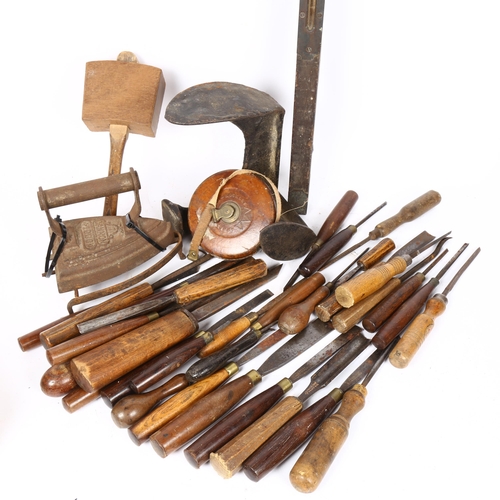 107 - A group of Antique woodworking chisels, tools, measuring tape etc