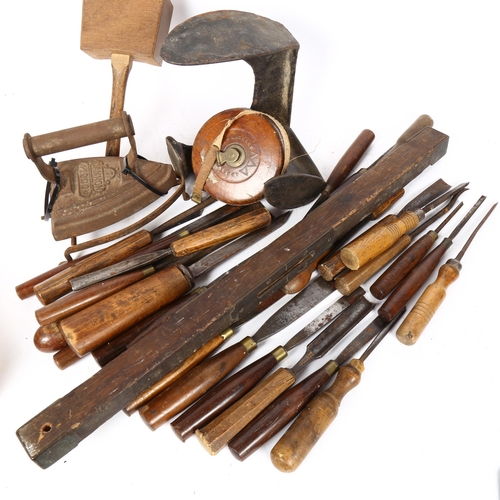 107 - A group of Antique woodworking chisels, tools, measuring tape etc