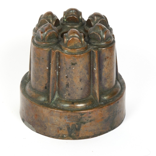 113 - A Victorian copper jelly mould, by Benham & Froud, with orb and cross mark, no. 481, diameter 12.5cm... 