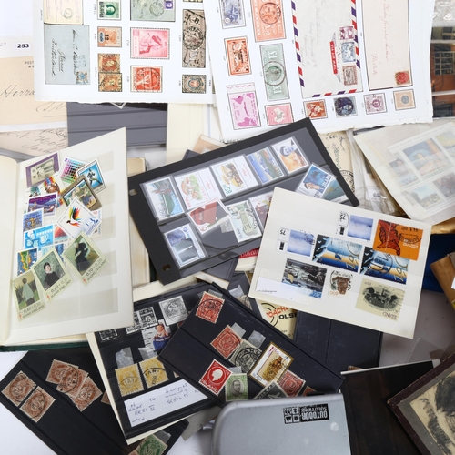 139 - A quantity of Vintage loose postage stamps, including First Day Covers