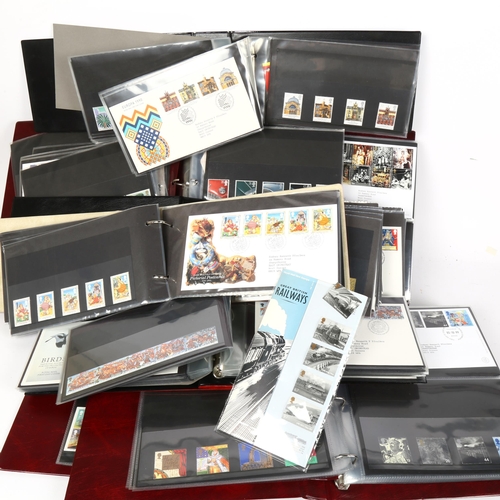 145 - A quantity of Royal Mail First Day Covers and postage stamp albums