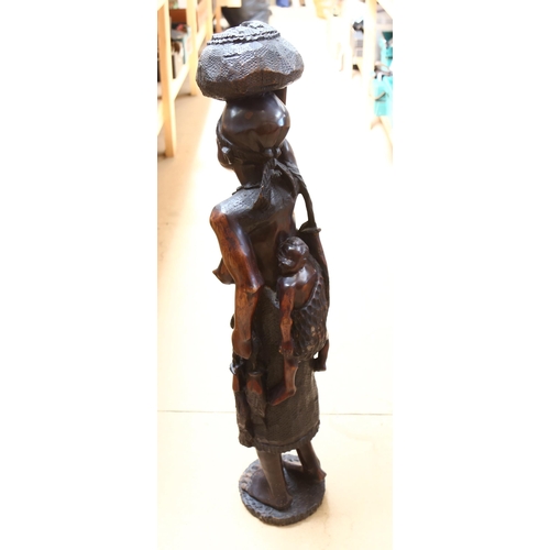 146 - A large African Tribal carved hardwood figural sculpture, height 108cm