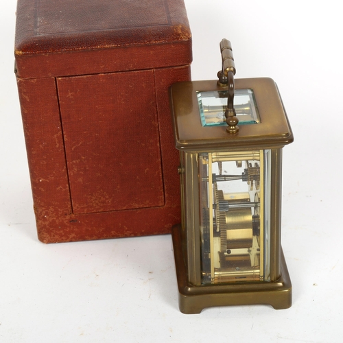 154 - A brass-cased carriage clock, by Dobell Brothers of Hastings, height 11cm, in red leather travelling... 