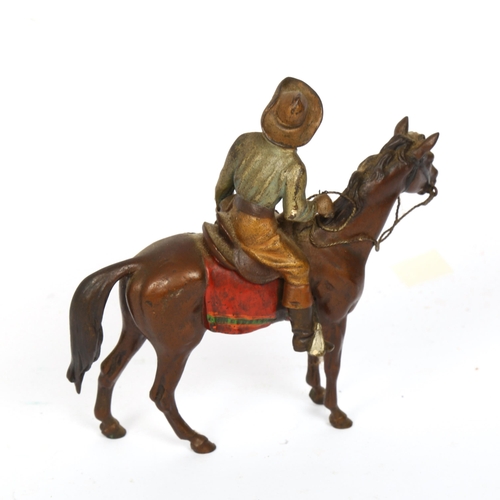 157 - Austrian cold painted bronze cowboy on horseback, length 12cm, height 12cm