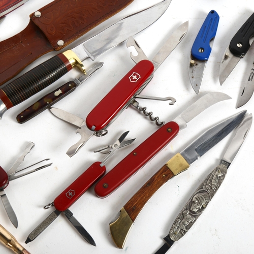 168 - A group of hunting and utility knives, including Swiss Army