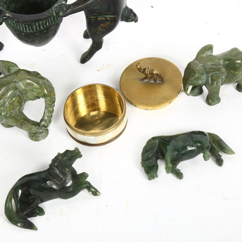 194 - A Roman style patinated bronze pig bowl, a pair of African polished soapstone elephants, jadeite hor... 