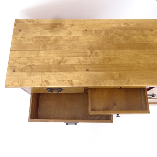 2001 - A contemporary light oak chest of 8 drawers, W127cm, H85cm, D43cm