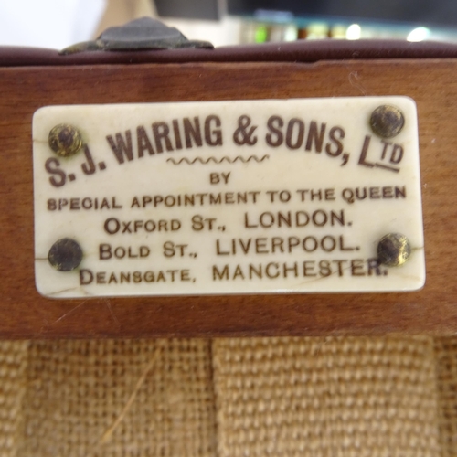 2011 - A pair of 19th century oak and leather upholstered side chairs, with maker's label for S.J. Waring &... 