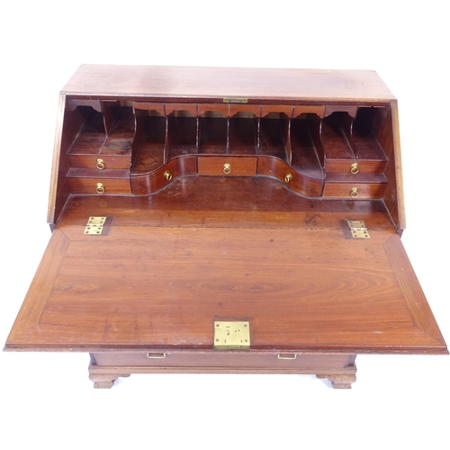 2012 - A George III mahogany and satinwood-banded bureau, the fall-front revealing a shaped fitted interior... 