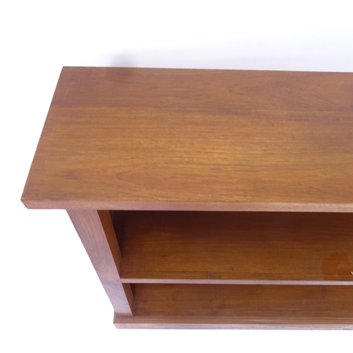 2013 - A modern oak open bookcase with single fitted shelf, L138cm, H88cm, D31cm