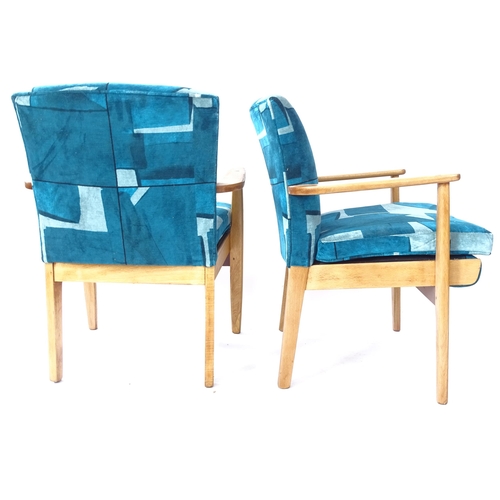 2024 - A pair of mid-century Parker Knoll armchairs