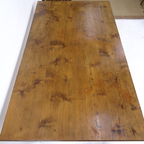 2041 - A polished pine top farmhouse kitchen table, on painted base, L147cm, H74cm, D84cm