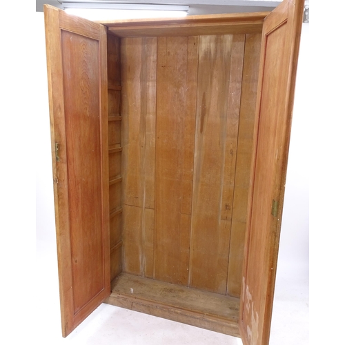 2045 - A stained pine 2-door larder cupboard, with 6 fixed shelves, W130cm, H212cm, D40cm