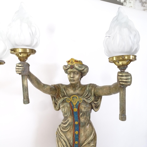 2055 - A pair of figural lights on column bases, with Art glass shades (both lamps have been restored aroun... 