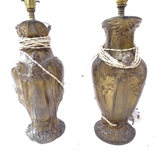 2058 - A pair of spelter urn design table lamps, height to top of bayonet fitting 43cm