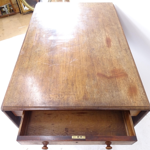 2063 - A large 19th century mahogany Pembroke table on turned legs, with single frieze drawer, drawer stamp... 