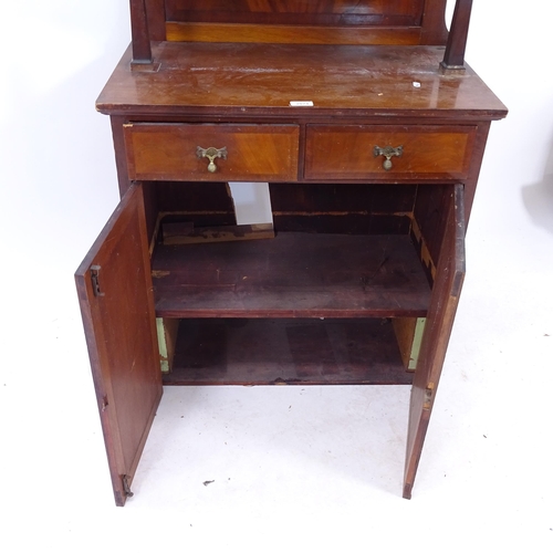 2074 - An early 20th century mahogany bookcase on cabinet, the top section having 2 glazed doors and the ot... 