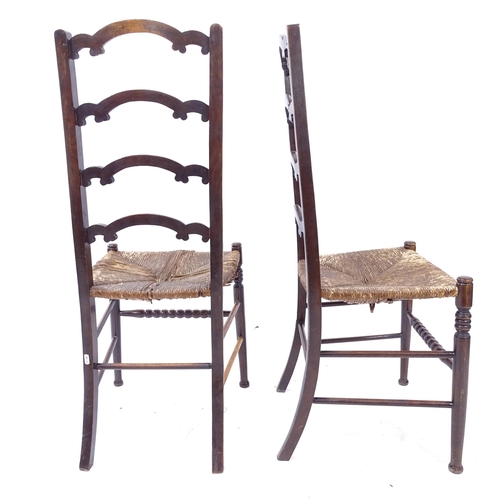 2081 - A pair of 19th century mahogany rush-seated ladder-back chairs, with impressed mark 