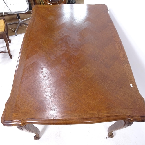 2092 - A French parquetry-topped oak draw leaf dining table, L148cm extending to 252cm, H75cm, D95cm