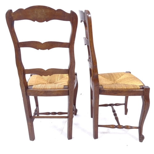 2093 - A set of 6 French oak ladder-back dining chairs