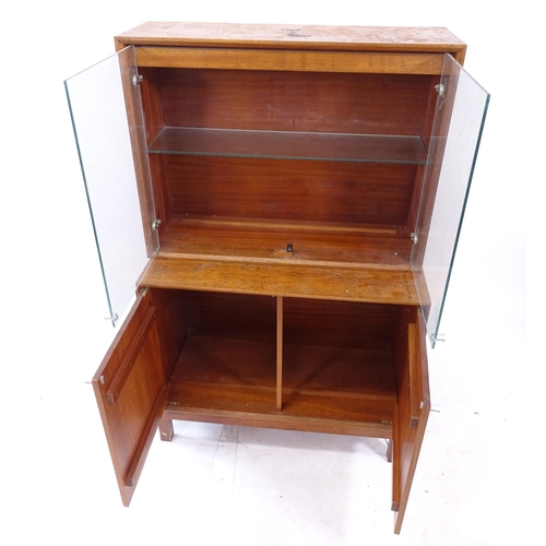 2105 - A mid-century teak 2-section display cabinet, having 2 glazed doors with cupboard under, W80cm, H125... 