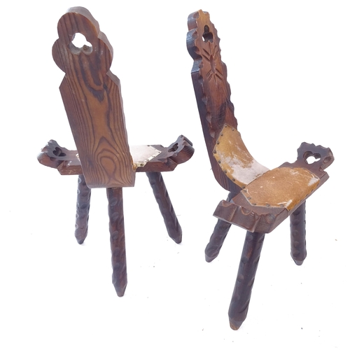 2109 - A pair of Welsh rustic spinning stools, with carved and pierced decoration