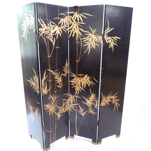 2112 - A Chinese black lacquered 4-fold draught screen, with allover gilded chinoiserie decoration, panel W... 