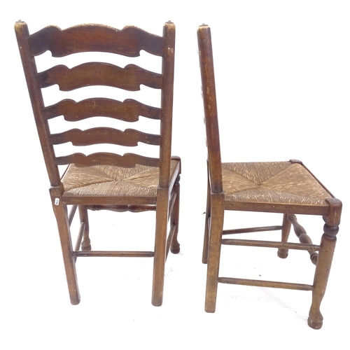 2144 - A set of 6 oak North Country style ladder-back rush-seated dining chairs