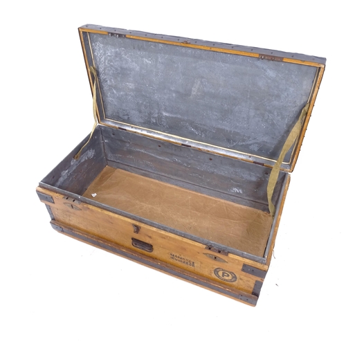 2151 - A large iron-bond military trunk, bearing the name Captain Philips, W117cm, H39cm, D55cm