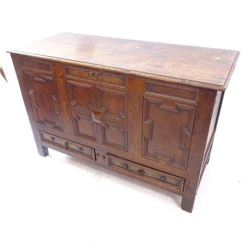 2160 - An Antique panelled oak mule chest, W128cm, H82cm, D53cm