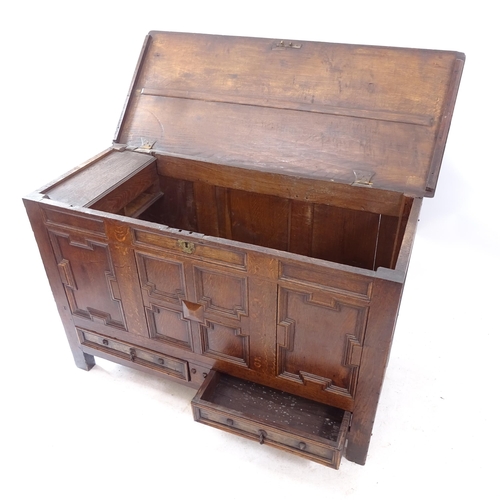 2160 - An Antique panelled oak mule chest, W128cm, H82cm, D53cm