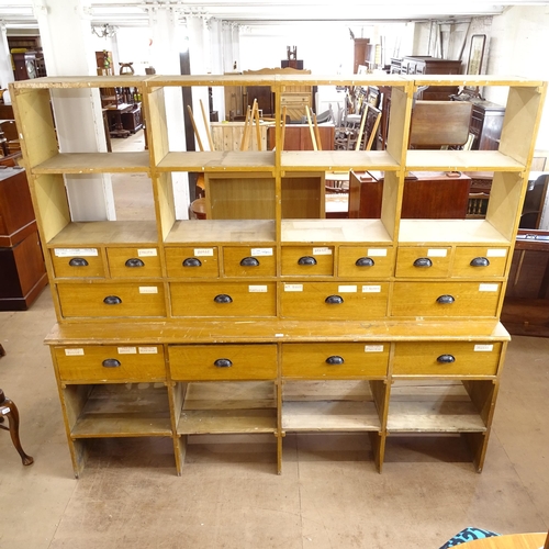 2163 - A 2-section pine bank of drawers, W226cm, H205cm, D50cm