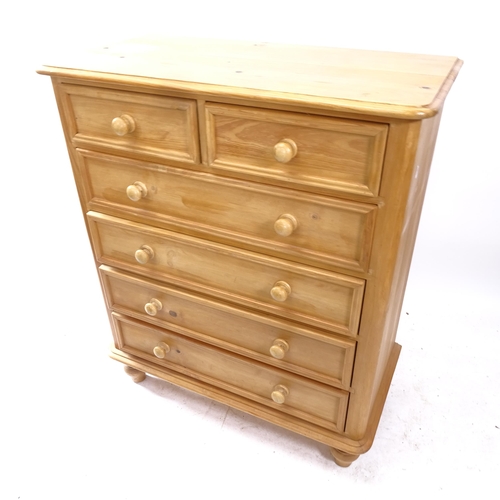 2166 - A reproduction polished pine chest of 2 short and 4 long drawers, on bun feet, W91cm, H109cm, D47cm