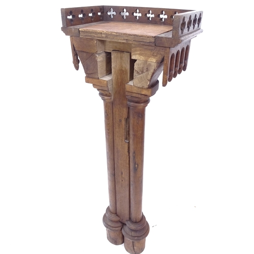 2168 - A Victorian oak Gothic church lectern, on a cluster column support, H147cm