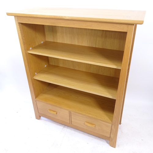 2178 - A modern light oak bookcase, with 2 adjustable shelves and 2 fitted drawers, W105cm, H128cm, D41cm