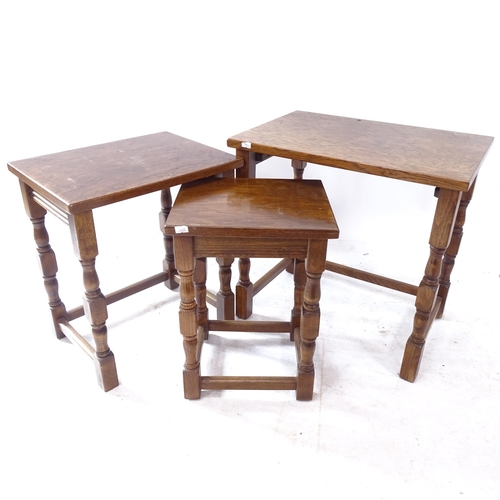 2252 - A rectangular oak nest of 3 occasional tables