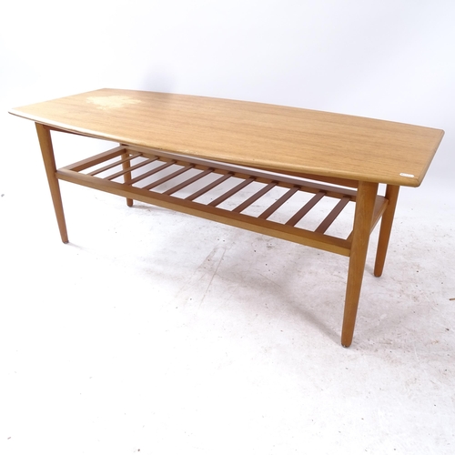 2265 - A mid-century style 2-tier teak coffee table, L120cm, H48cm, D55cm