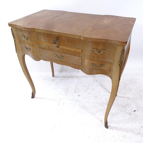 2266 - A French walnut metamorphic dressing table/side table, with inlaid parquetry top, brushing slide and... 