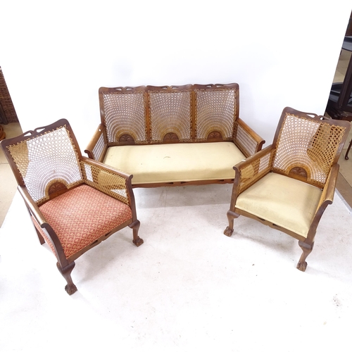 2267 - A 1920s  mahogany bergere 3-piece suite with cane backs and claw and ball feet, consisting of a 3-se... 