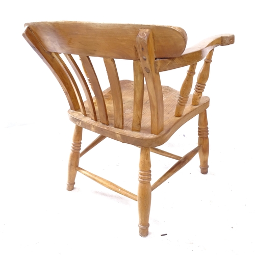 2271 - An early 20th century pine stick-back elbow chair