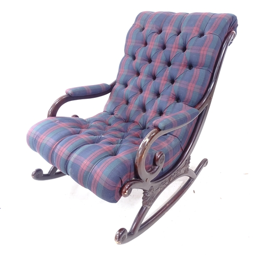 2279 - A reproduction mahogany rocking chair, with button-back tartan upholstery