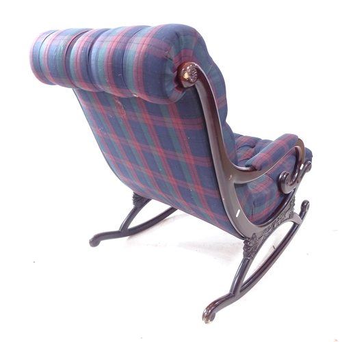 2279 - A reproduction mahogany rocking chair, with button-back tartan upholstery