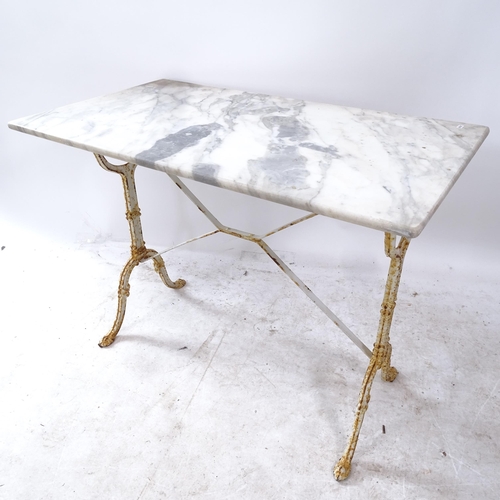 2281 - A rectangular marble-top garden table on painted cast-iron base, L100cm, H72cm, D57cm